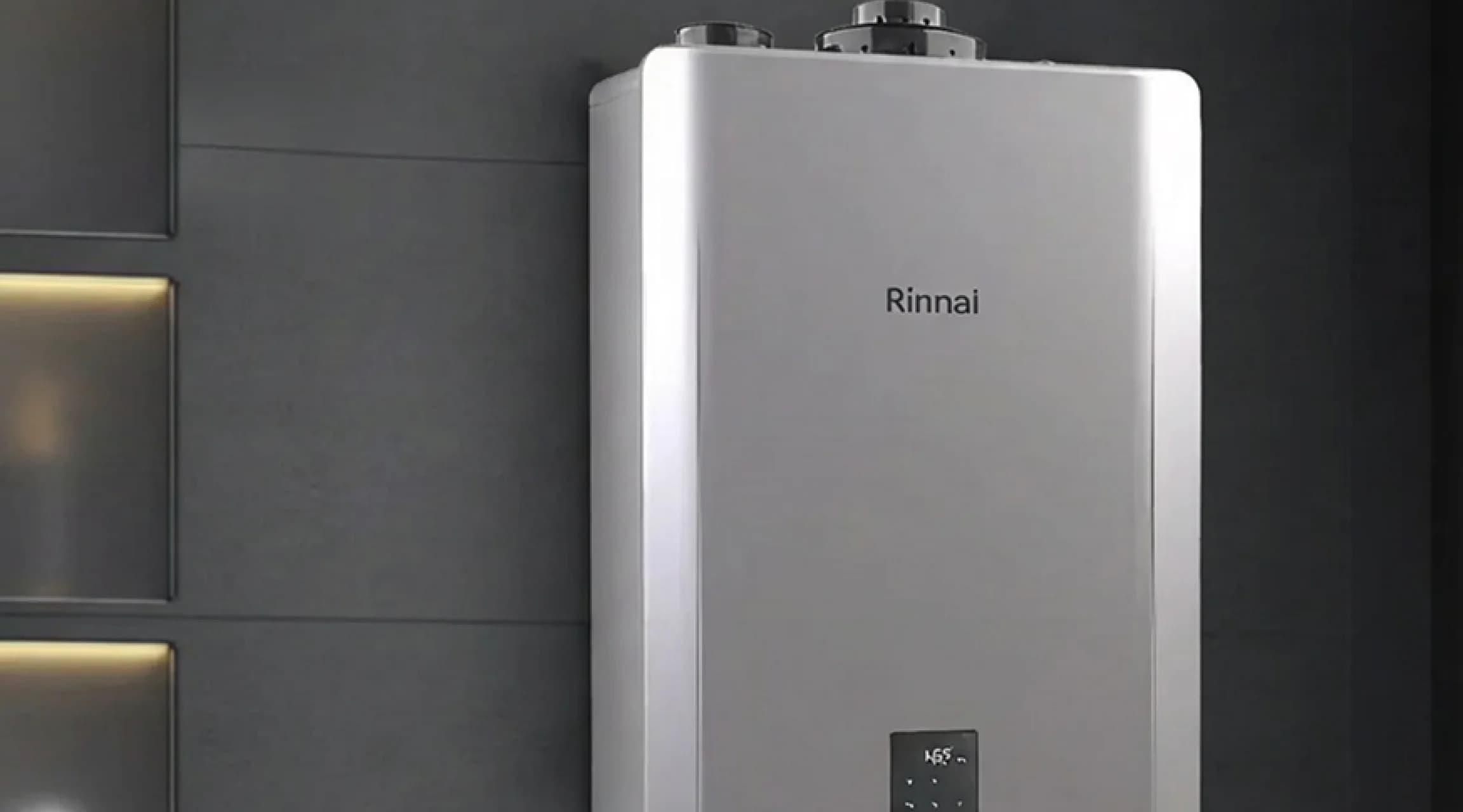 A Rinnai water heater unit installed on a wall of a modern home.